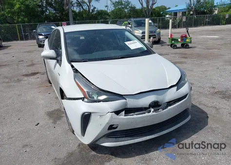 2021 Toyota Prius Xle from USA, damaged, VIN JTDKAMFU4M3149362